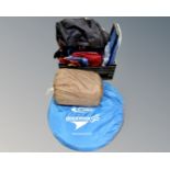 A crate of assorted bags, holdalls and ruck sacks,