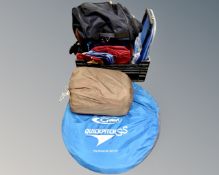 A crate of assorted bags, holdalls and ruck sacks,
