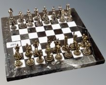 A marble and gilt metal thirty two piece Erotic chess set