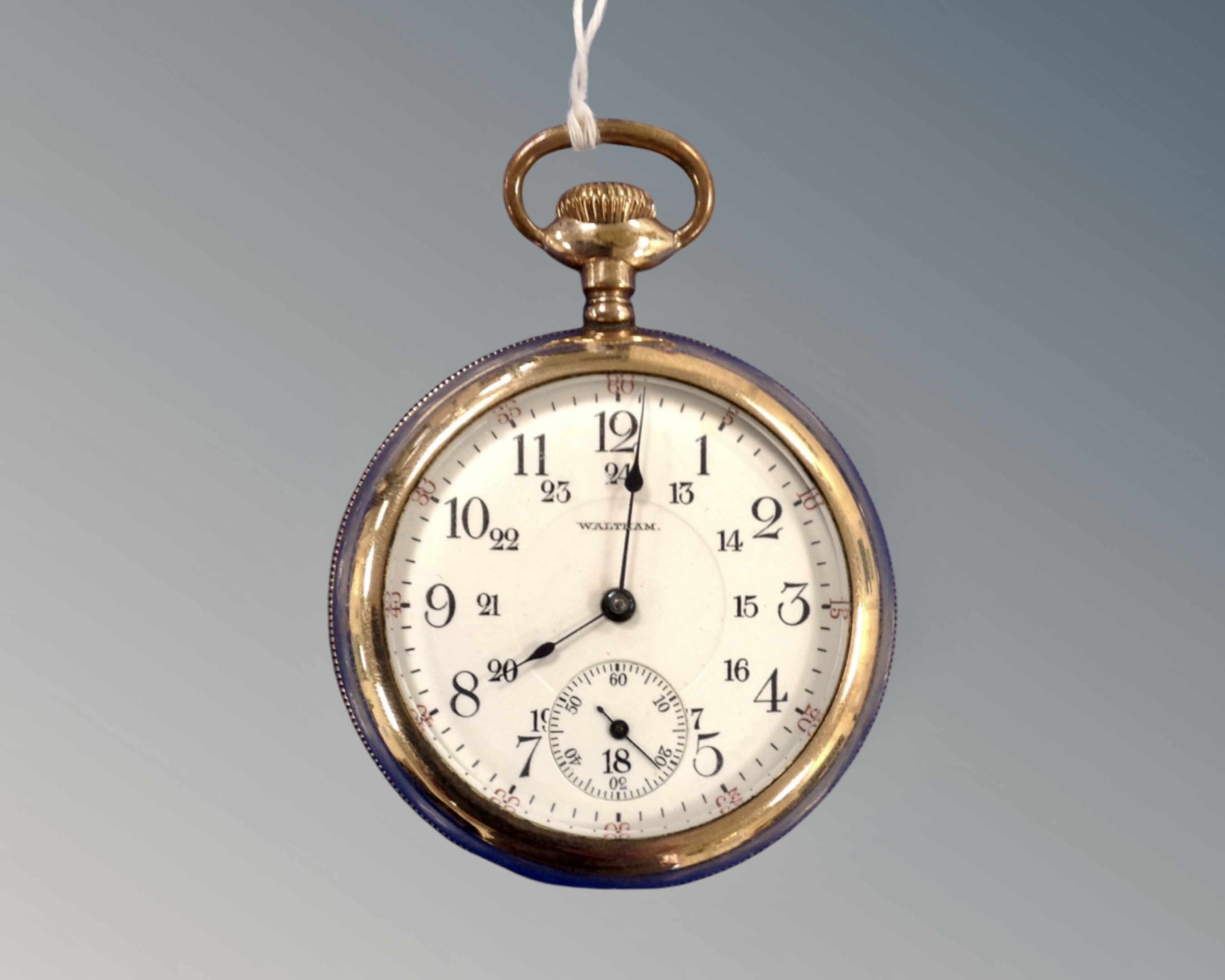 A gold plated Waltham pocket watch