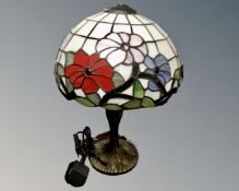 An Art Deco style table lamp with leaded glass shade