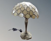 An Art Deco table lamp with leaded glass shade