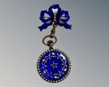 An antique fob watch mounted on bar with enamelled decoration