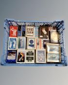 A crate of thirty packs of playing cards
