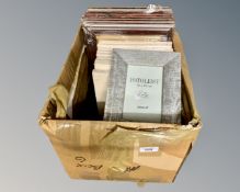 One crate containing twenty eight photo frames, different sizes and styles,