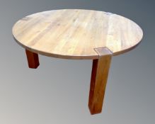 A contemporary Barker & Stonehouse oak dining table,