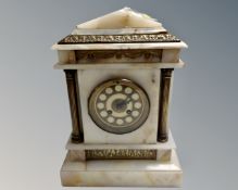 A French gilt and alabaster mantel clock