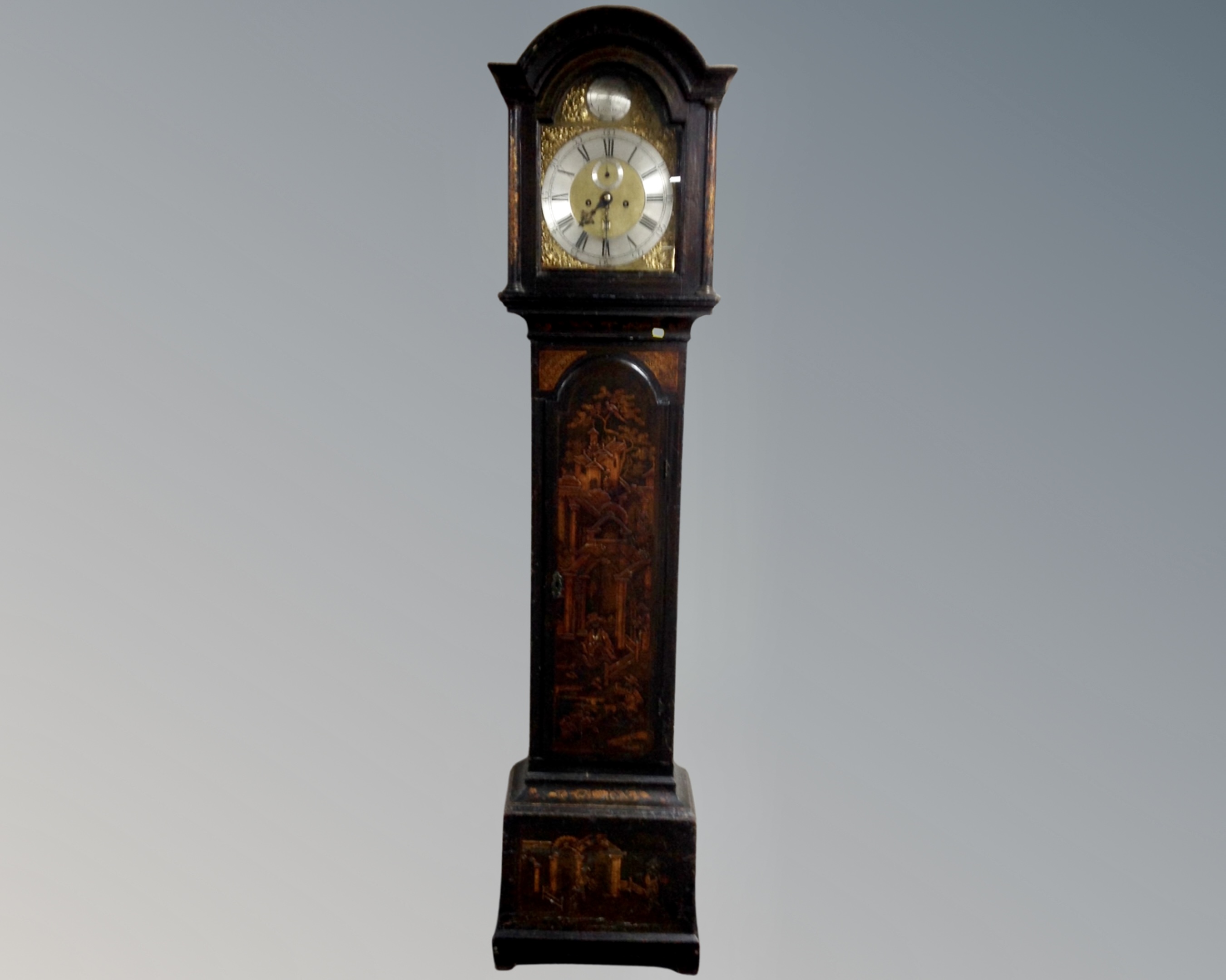 An 18th century and later Chinoiserie longcase clock, the lacquered case and hood circa 1760,