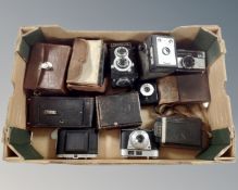 A box of vintage cameras : Kodak plate, Kodak brownies,