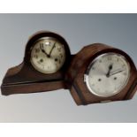 An oak cased 1930's eight day mantel clock with silvered dial and a one further