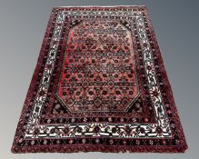 An Iranian Hamadan rug, 140cm by 205cm.