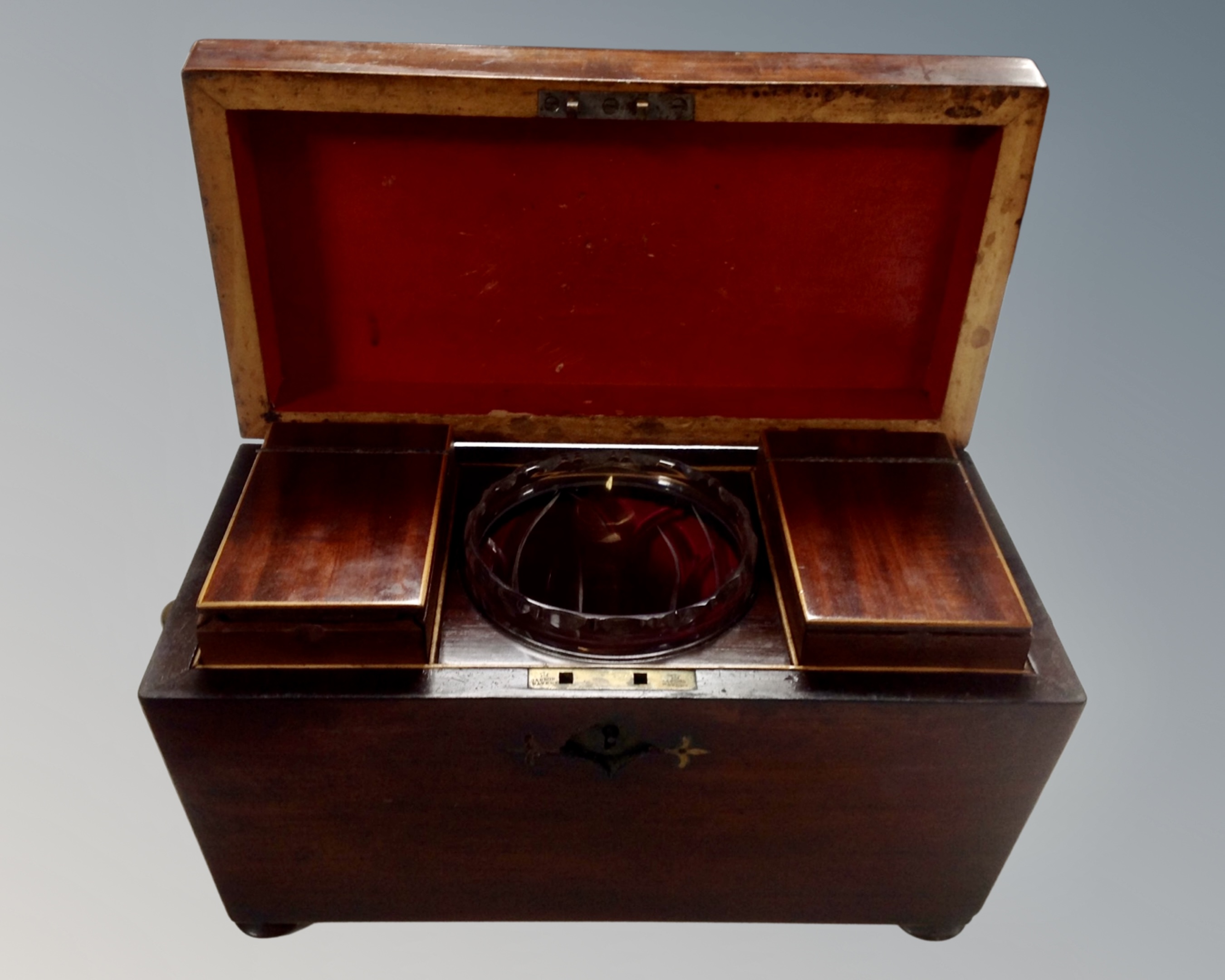 A Victorian mahogany sarcophagus tea caddy