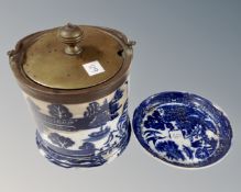 An antique blue and white lidded caddy together with a similar circular dish