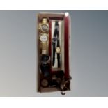 A box of a silver trophy and six assorted watches including Rotary, Cross Hatch,