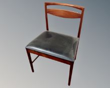 A mid century Scandinavian dining chair with vinyl seat