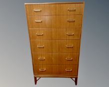 A 20th century McIntosh Furniture teak knee hole dressing table with triple mirror,