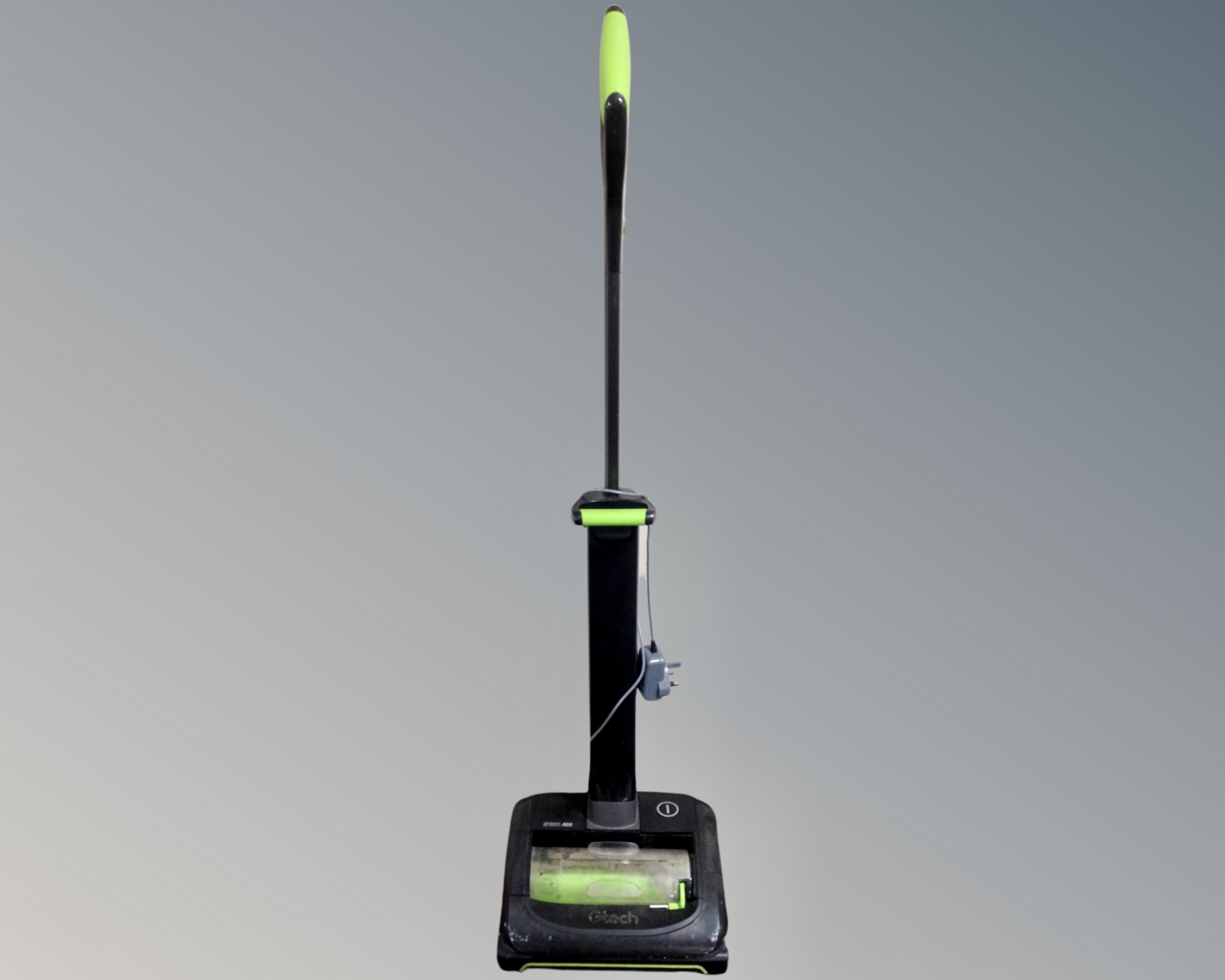 A GTec Air Ram 22 volt electric cordless carpet sweeper with lead