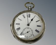 A silver cased pocket watch.