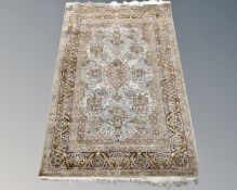 A fringed Kashmir carpet