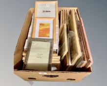 One crate containing fifty five photo frames, different sizes and styles,