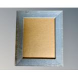 One crate containing twenty seven blue wood photo frames, 20 cm x 25 cm.