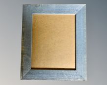 One crate containing twenty seven blue wood photo frames, 20 cm x 25 cm.