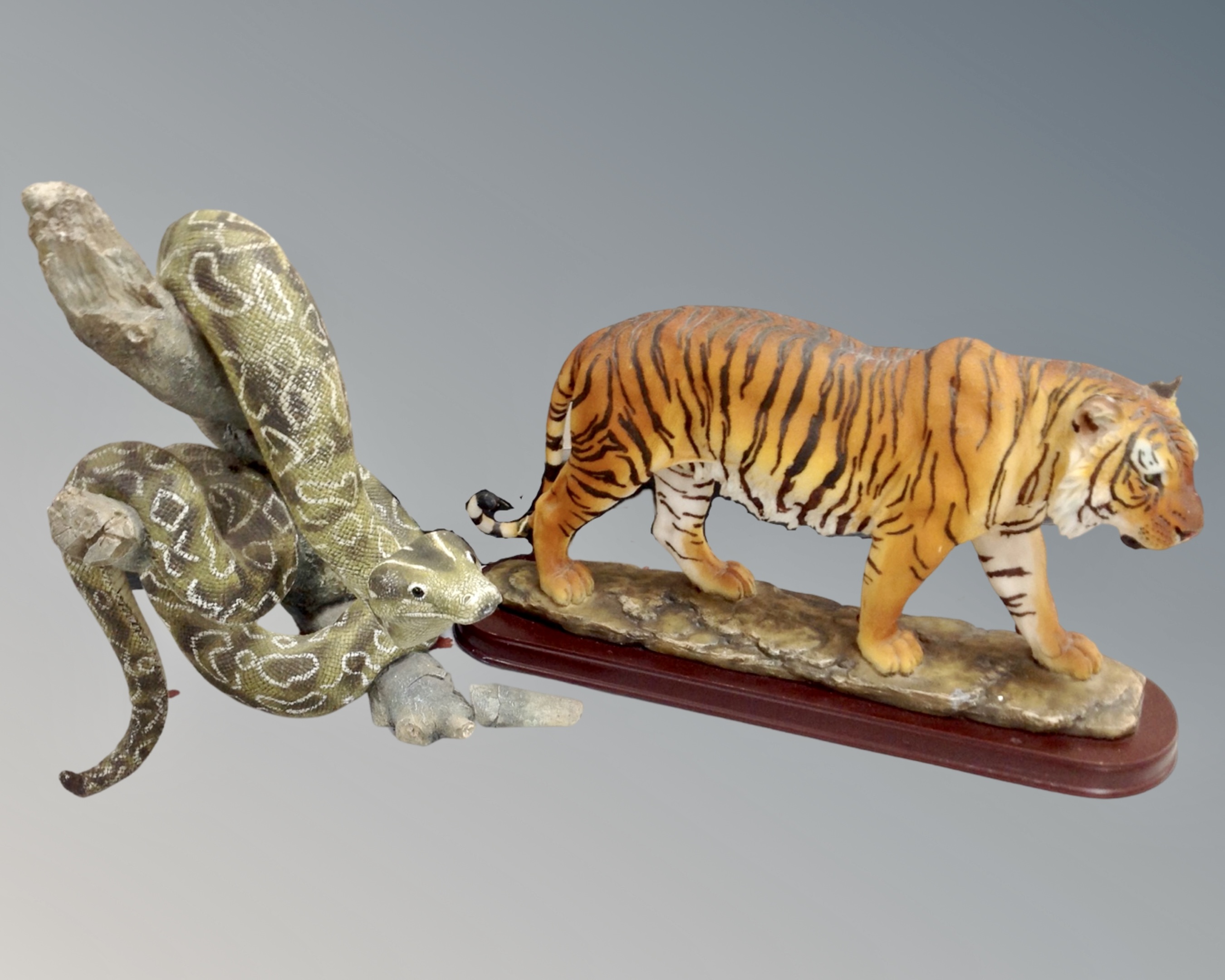 Two large Leonardo Collection figures : snake on a branch and a tiger on a plinth