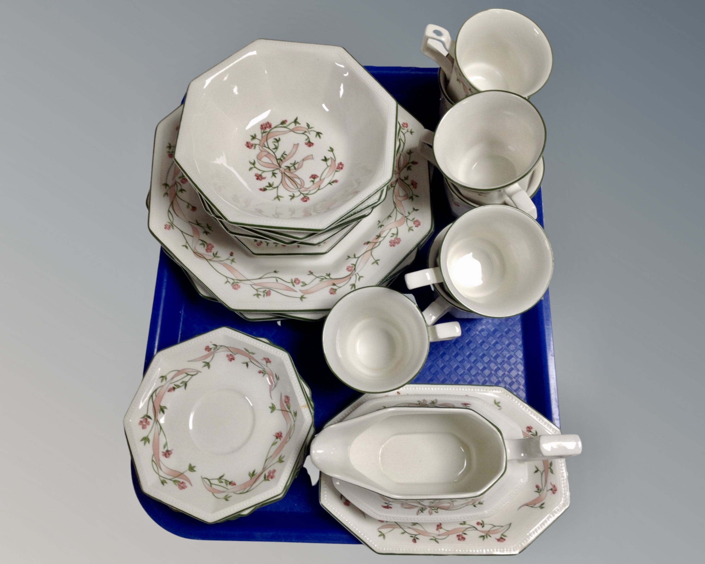 A tray of Johnson Brothers Eternal Bow tea and dinner ware