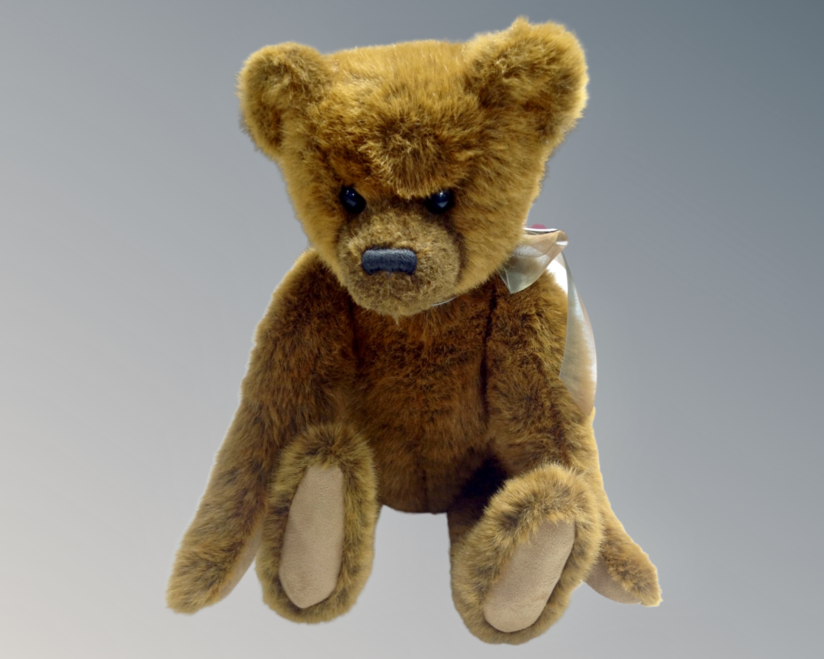 A Charlie Bear Cameron tagged teddy bear