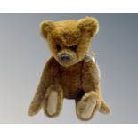 A Charlie Bear Cameron tagged teddy bear