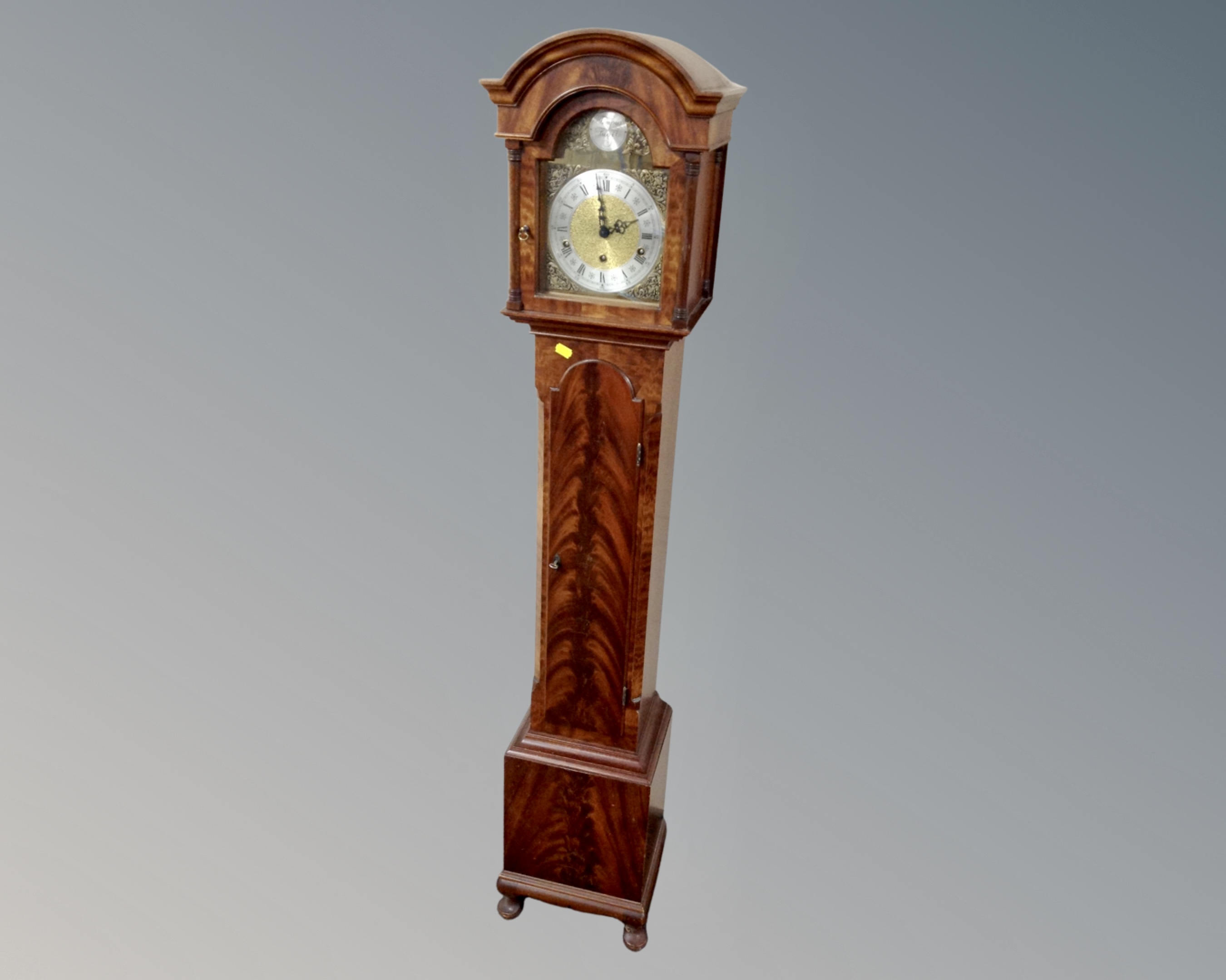 A mahogany cased Tempus Fugit granddaughter clock