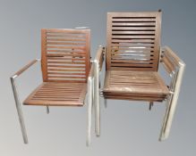 A set of five metal and wooden slatted stacking garden chairs