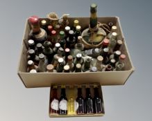 A box of alcohol miniatures and alcohol bottles only