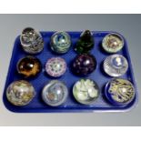 A tray of twelve glass paperweights : Caithness, Wedgwood,