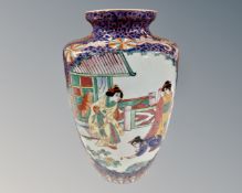 An Oriental vase depicting Geisha,