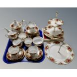 A thirty two pieces of Royal Albert Old Country Roses tea china and set of matching place mats