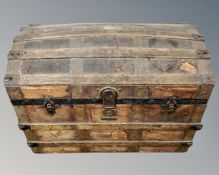 An antique bentwood shipping trunk