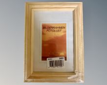 One crate containing thirty six Fotolijst pine 10 cm x 15 cm photo frames,