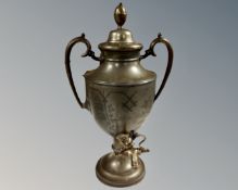 A silver plated tea urn