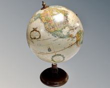 A Replogle 12 inch diameter globe on stand
