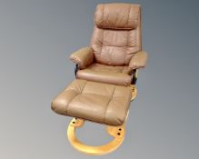 A Scandinavian swivel relaxer armchair with footstool, upholstered in brown leather.