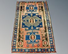 A Sarab rug, 140cm by 215cm.