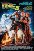 A collection of 12 movie posters to include: Back to the Future III, Transformers, The Lion King,