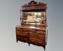 A Victorian mahogany seven drawer mirror back sideboard.