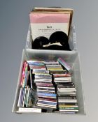 Two boxes containing a quantity of CDs 45s and LP records including classical.