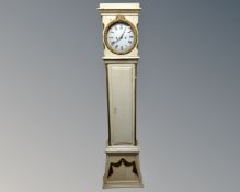 A continental painted oak longcase clock with weights.