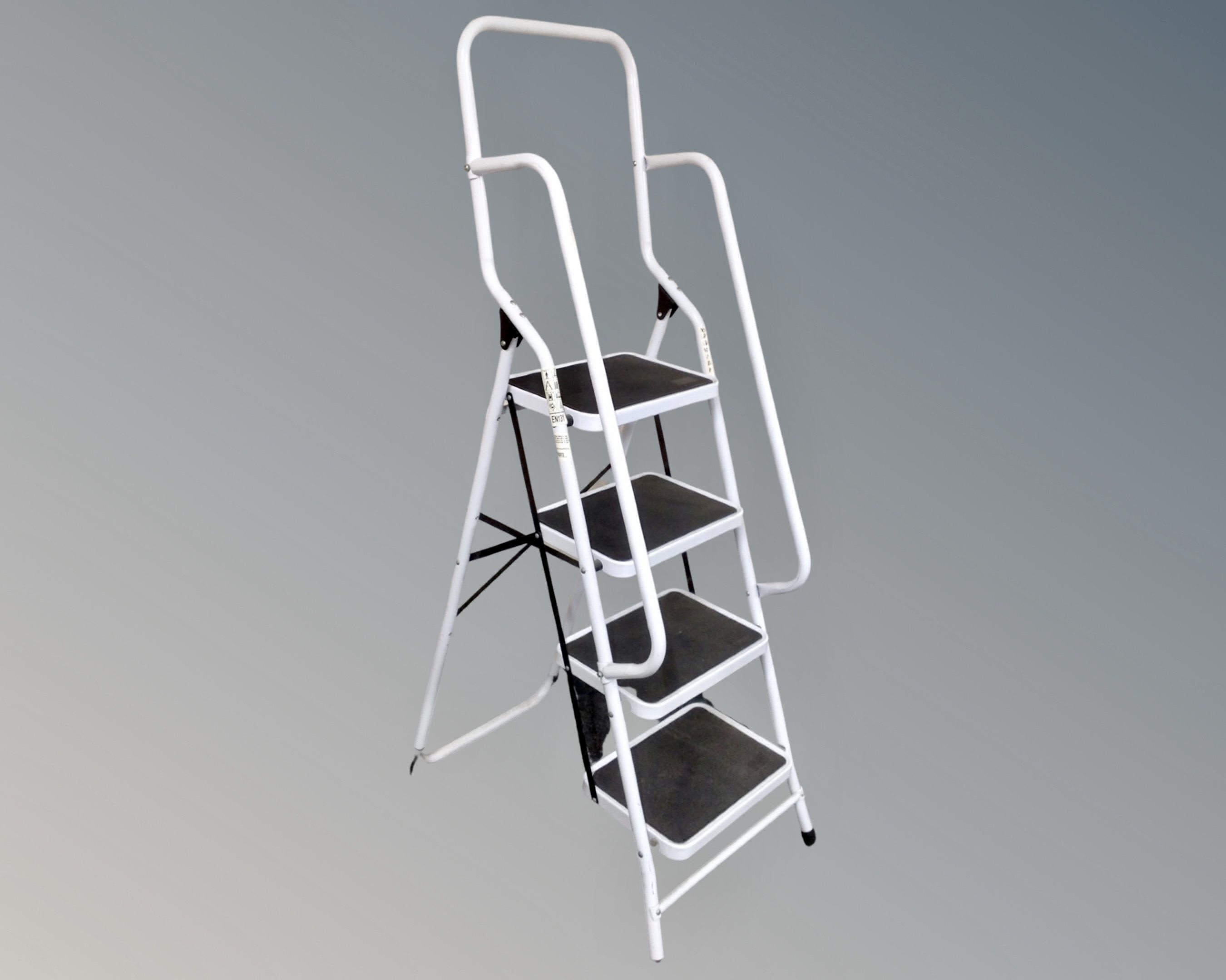 A four-tread folding step ladder with double hand rail