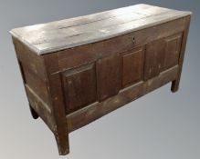 A late 18th/early 19th century oak panelled coffer.