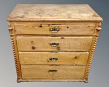 An antique pine four drawer chest, no feet.