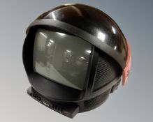 A Philips Discoverer retro television in the form of an astronaut's helmet.